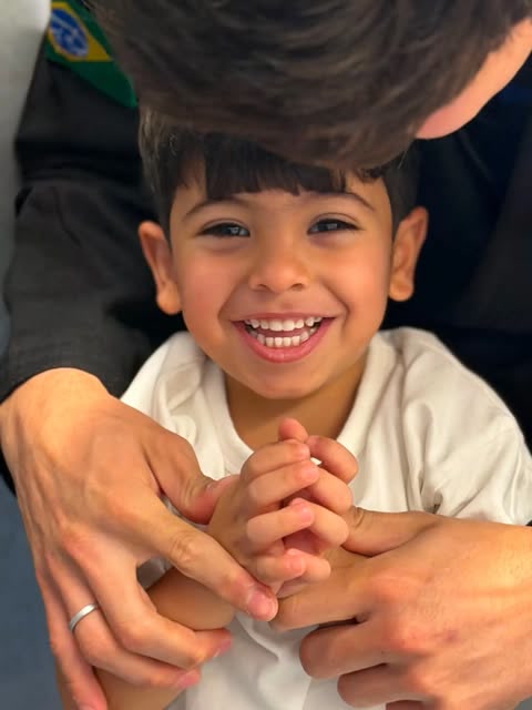 Young student smiling during class at the academy